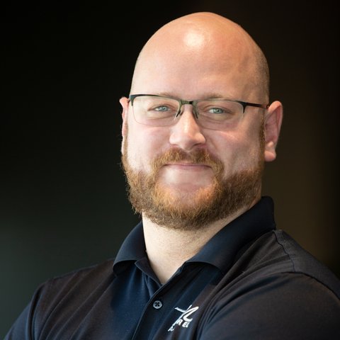 Ryan Toney, grand poobah of many hats + owner at P&M Apparel